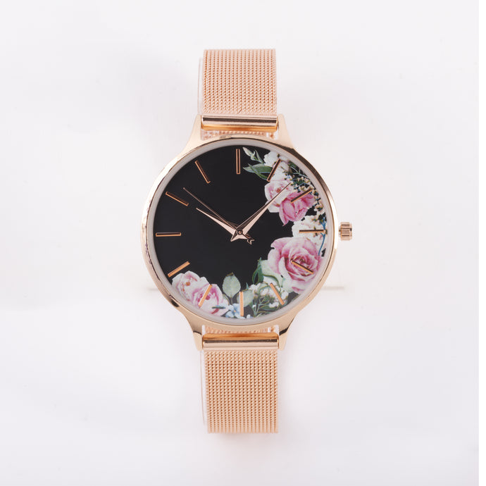 Montre rose cadran rond fond floral