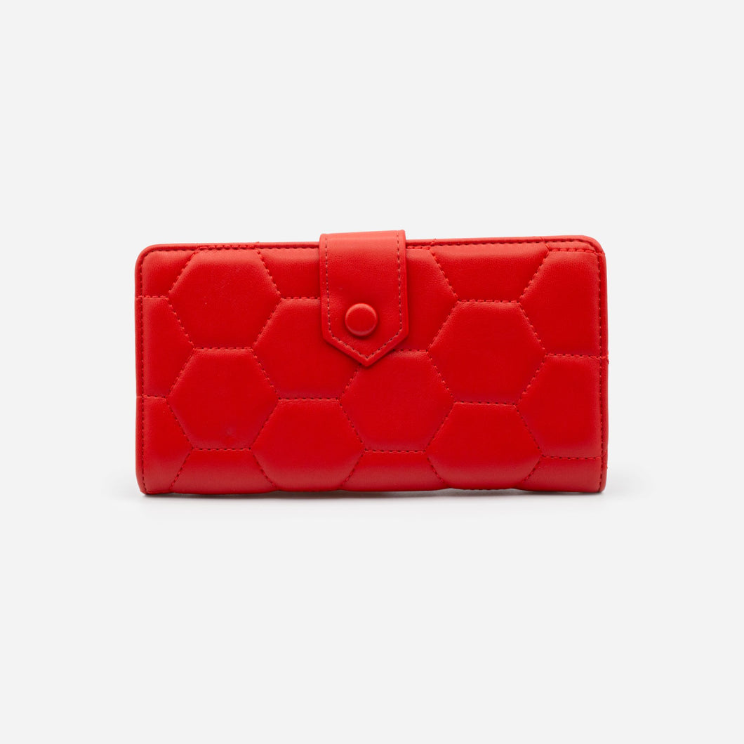 Red wallet quilted with hexagonal patterns