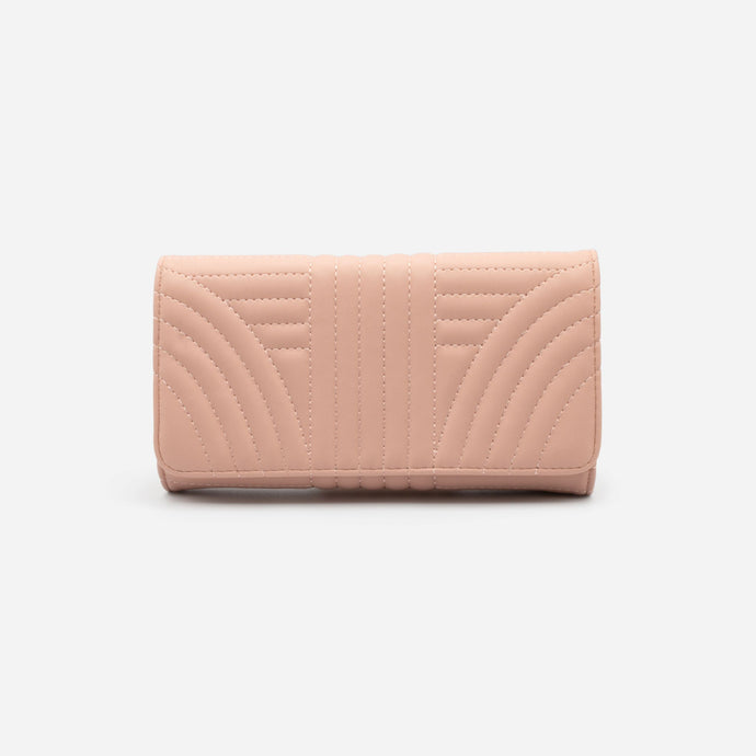 Old pink quilted wallet with linear patterns