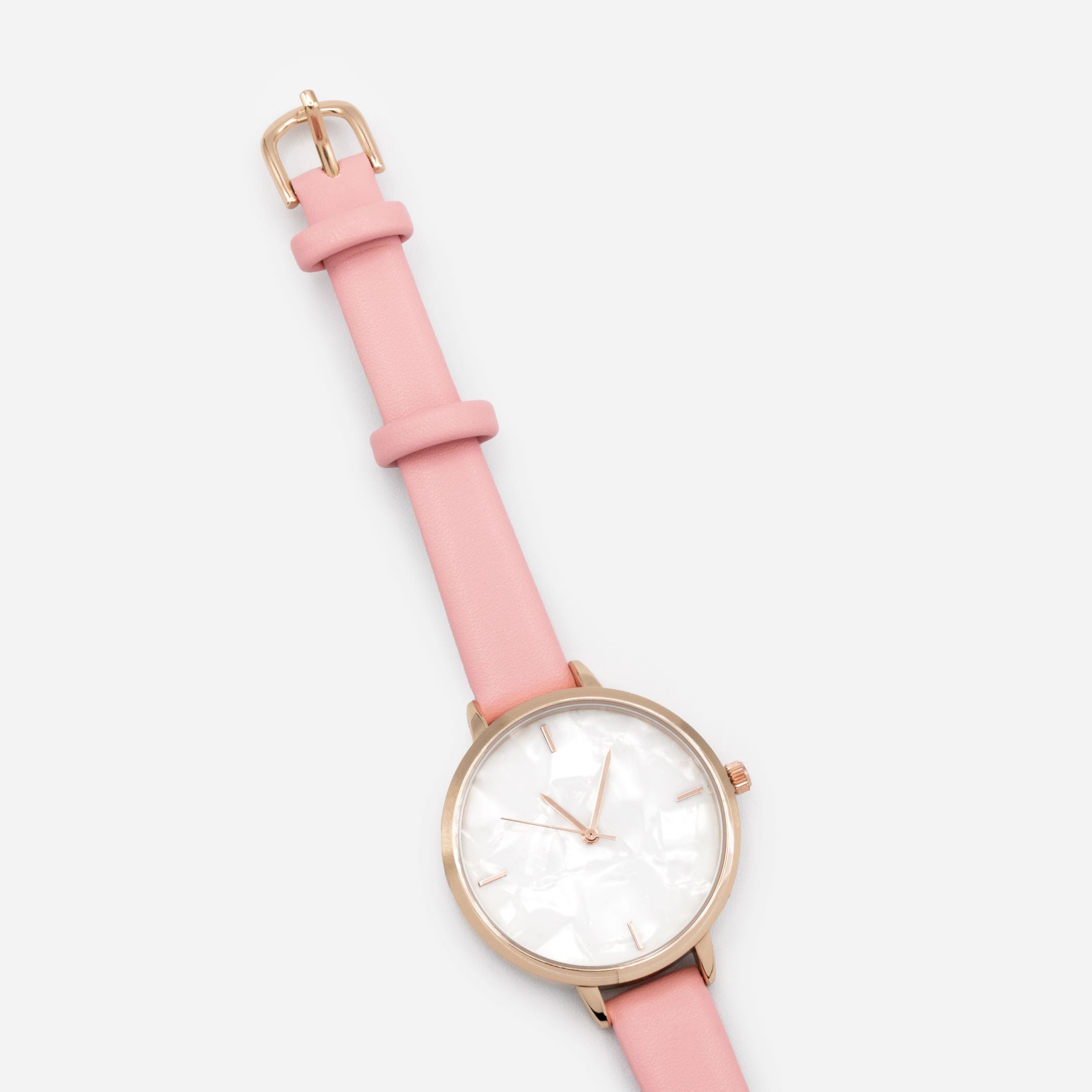 Montre rose pâle en similicuir à boîtier rond rose doré et cadran blanc nacré