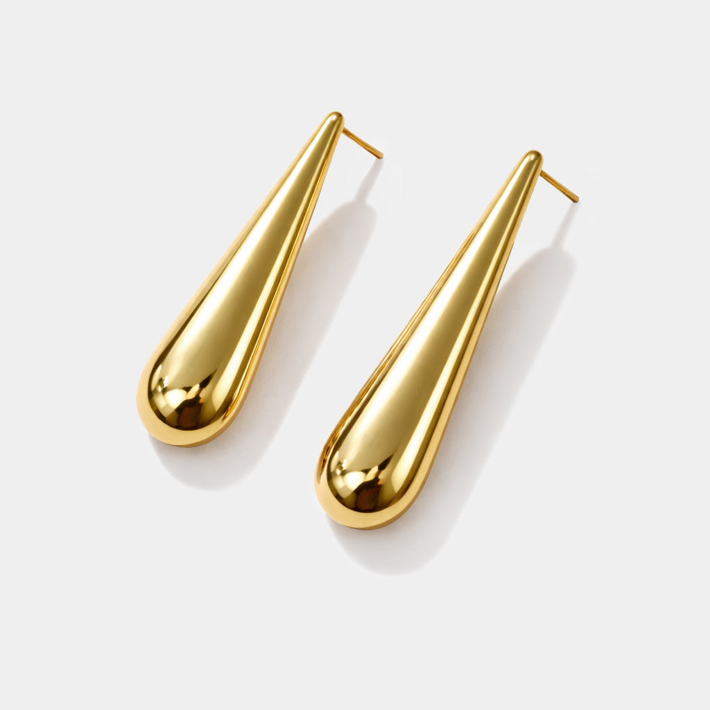 Bizou SF253E002GL – Gold elongated teardrop drop earrings in stainless steel, high-polish finish, angled view