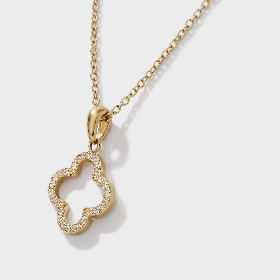 Bizou SF253N018GL – Close-up of gold four-petal clover charm with cubic zirconia detail on stainless steel chain, Bizou jewelry