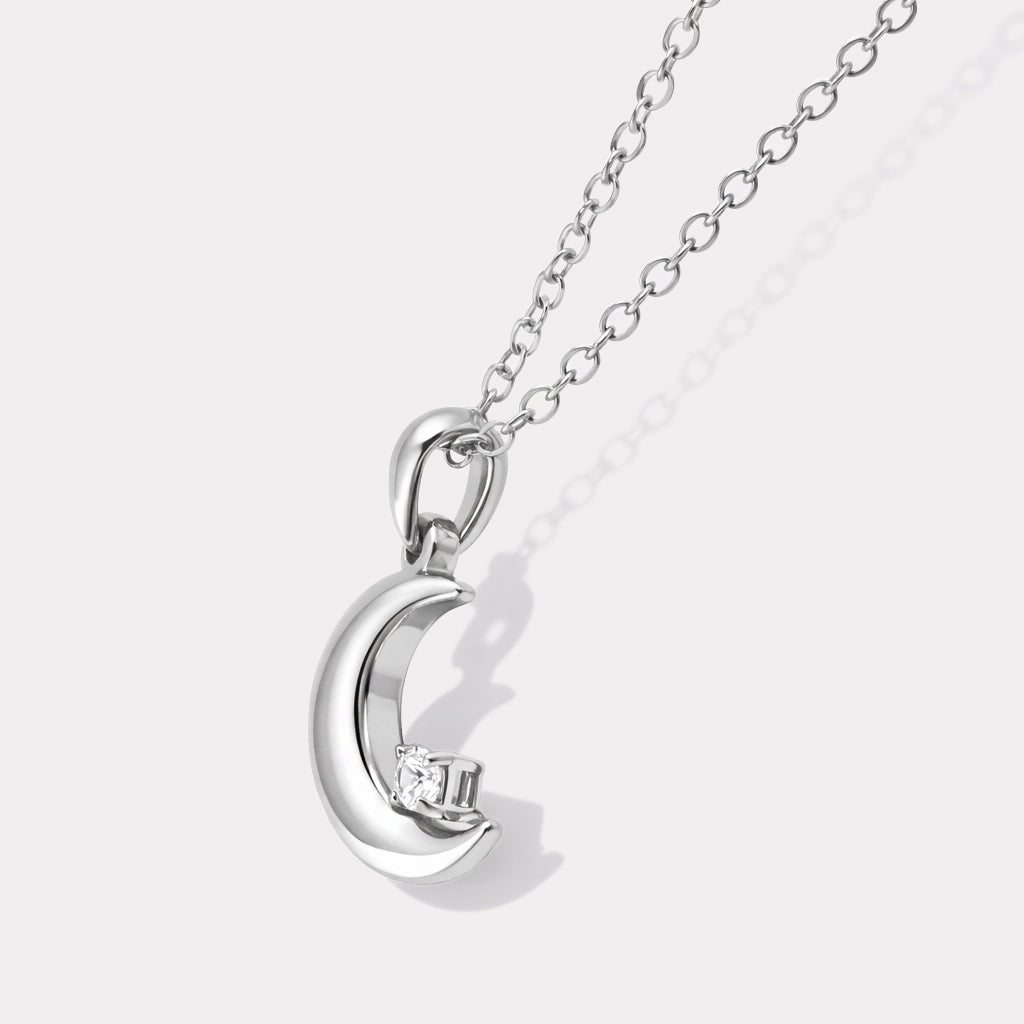 Bizou SF253N019SL – Close-up of silver chunky crescent moon charm with cubic zirconia detail on stainless steel chain, Bizou jewelry