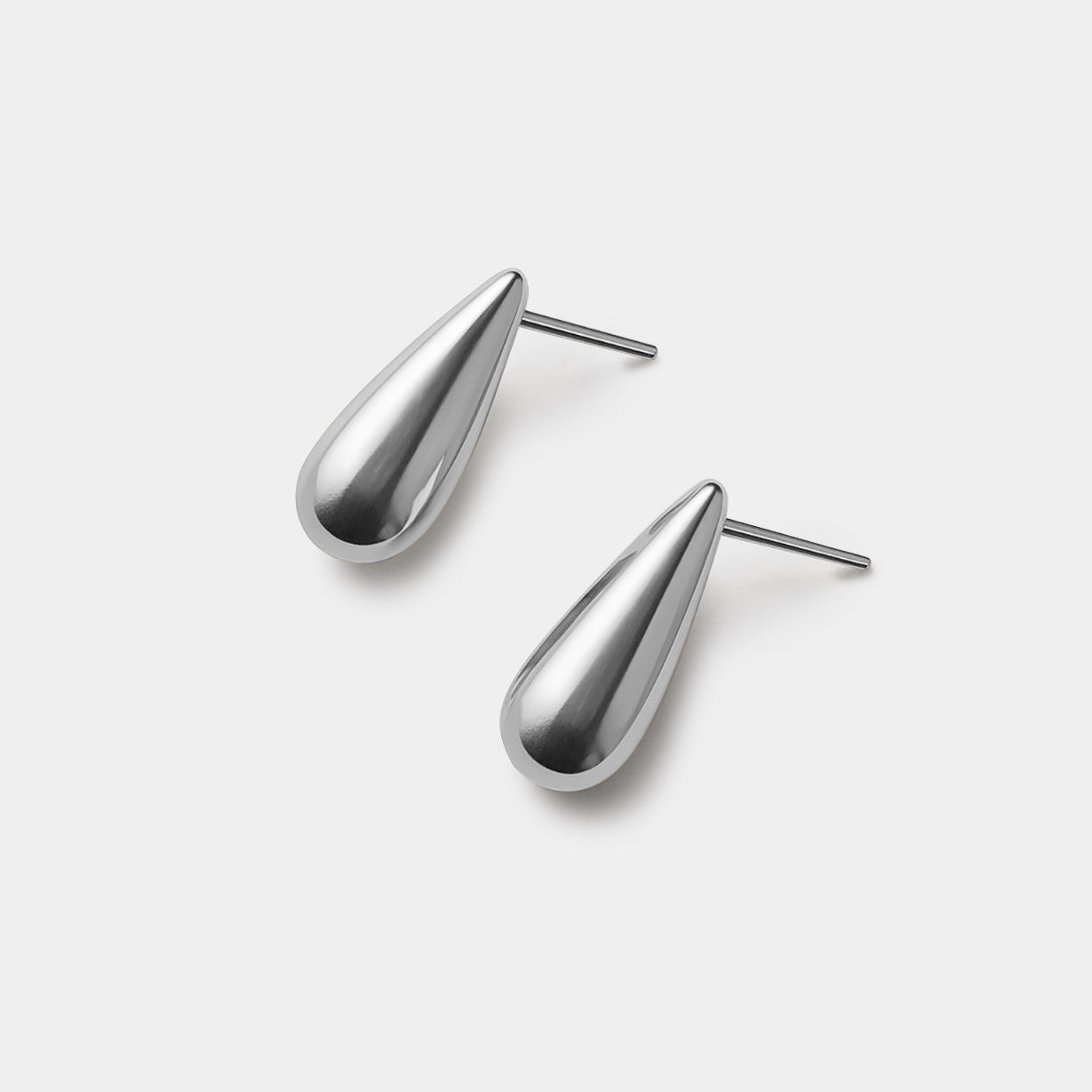 Bizou SS253E001SL – Silver bold teardrop stud earrings in stainless steel, high-polish finish, front view, Bizou jewelry
