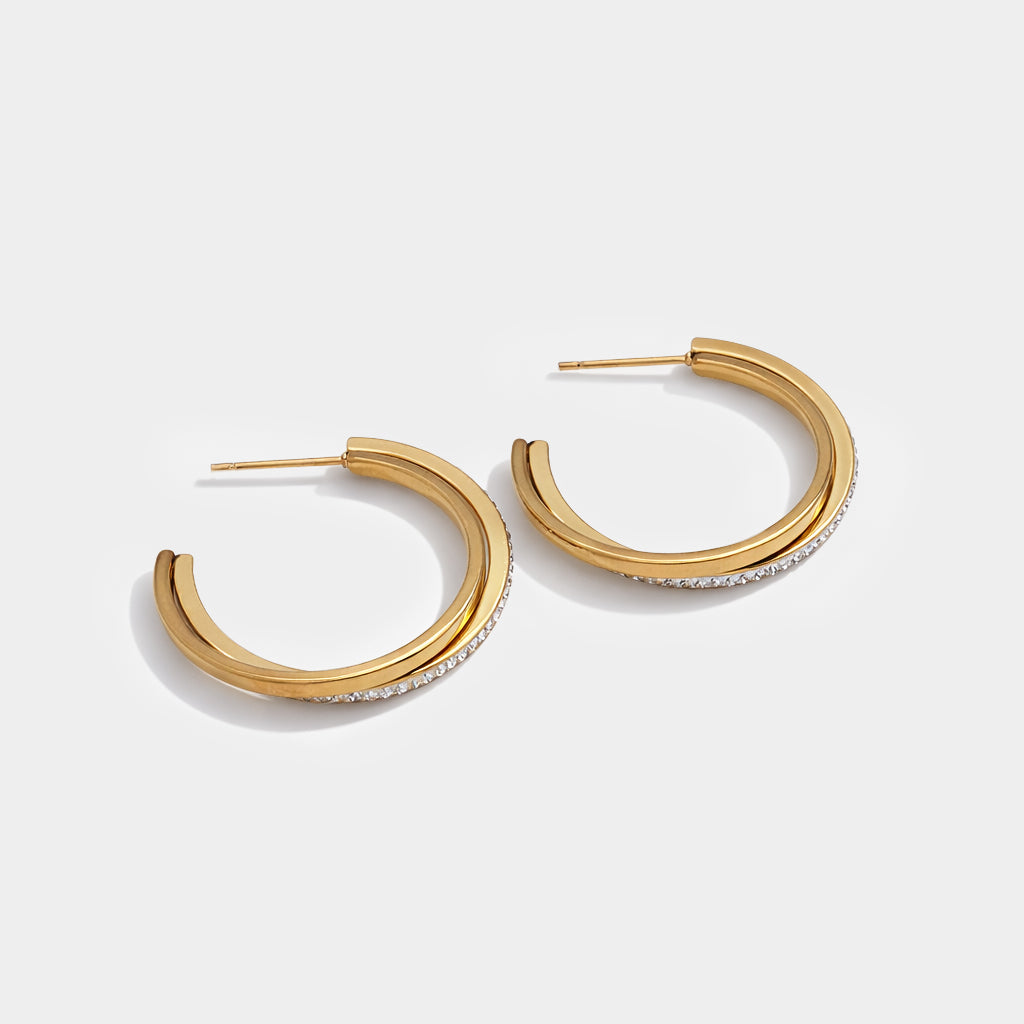 Bizou SS253E005GL – Gold stainless steel double-band hoop earrings with CZ crystal detail, open C-shape, angled view, Bizou jewelry