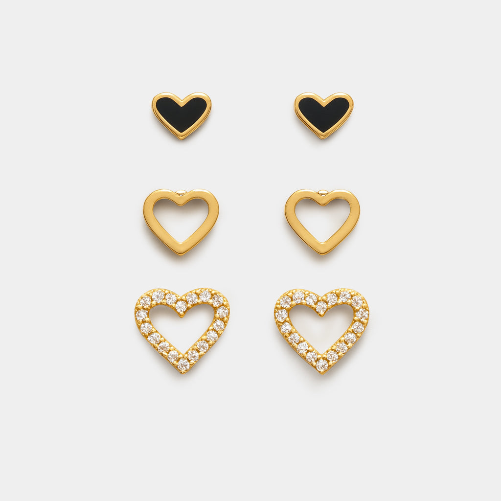 Bizou SS253E013GL – Gold heart earrings 3-piece set in stainless steel, black enamel mini stud, open heart huggie and CZ pavé heart stud, front view
