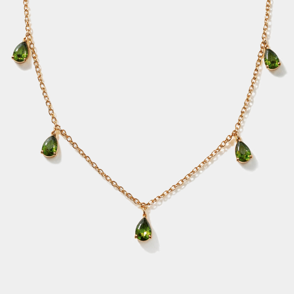 Bizou SS253N015GL – Gold multi-drop green pear-cut stone charm necklace in stainless steel, five dangling emerald-green charms on delicate cable chain, front view
