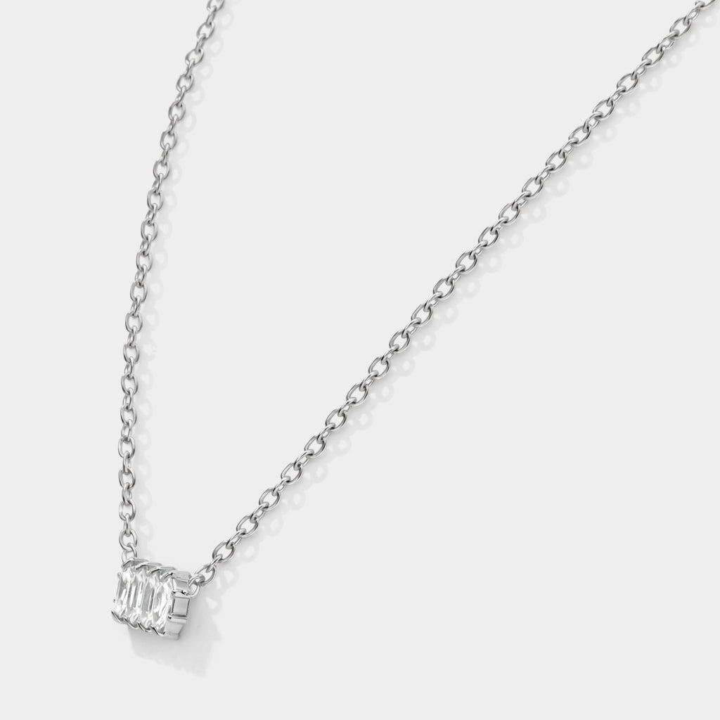 Bizou SS253N019SL – Close-up of silver stainless steel necklace with four marquise-cut CZ stones set horizontally, angled view, Bizou jewelry

