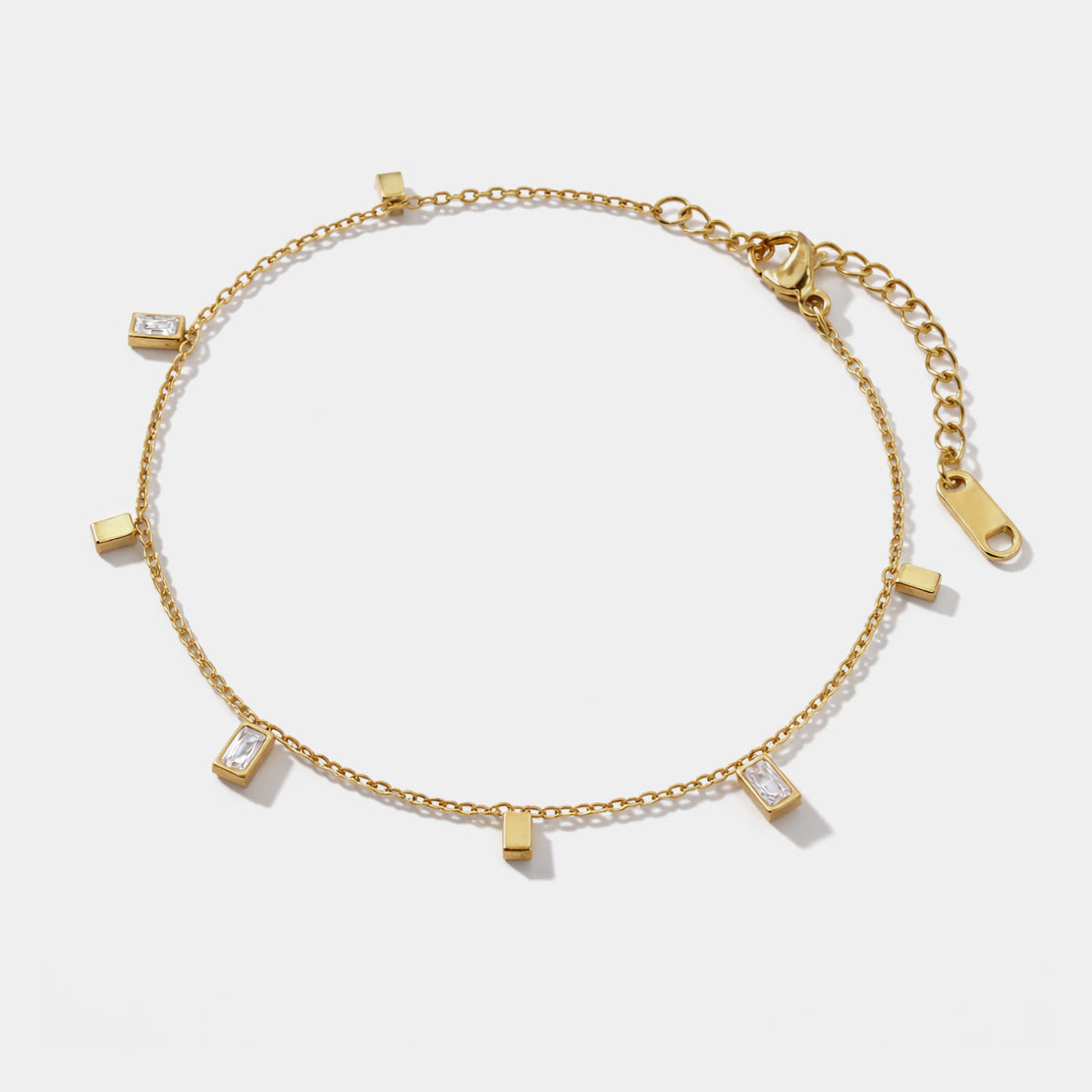 Stainless steel gold dangle charm bracelet with cubic zirconia stones and lobster clasp – Bizou