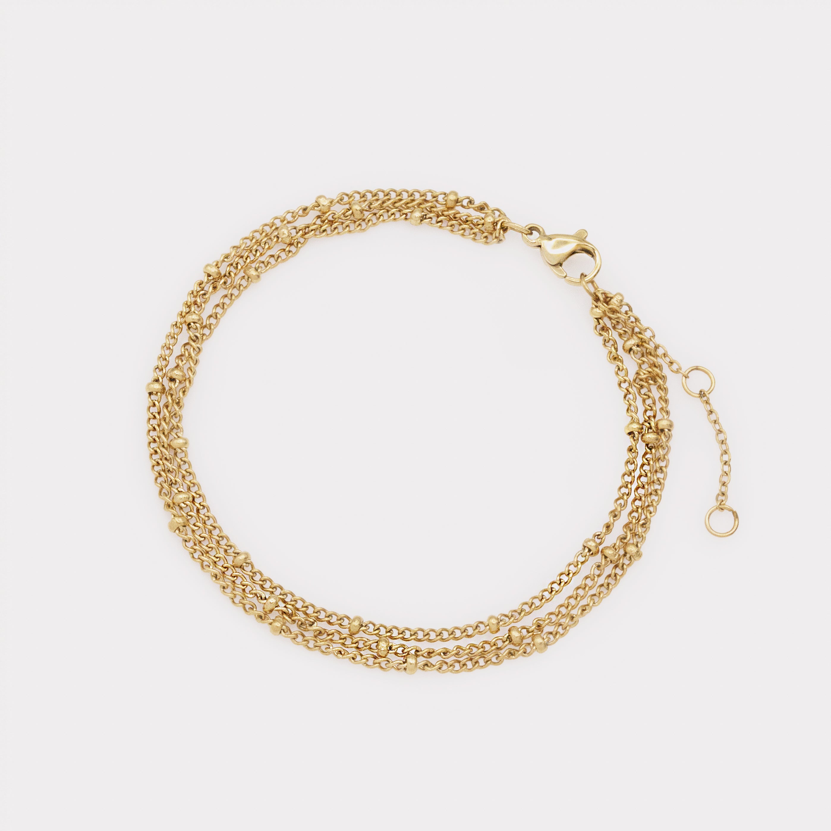 Gold triple chain beaded bracelet in stainless steel with lobster clasp – Bizou
