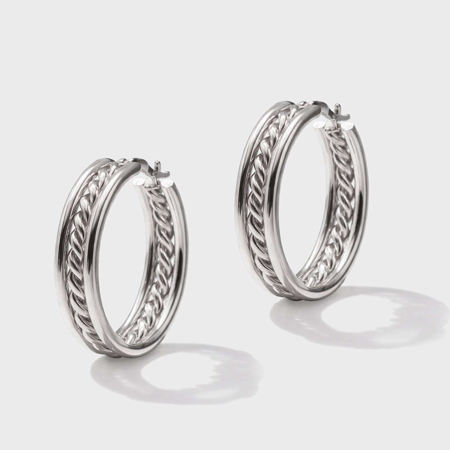 Stainless steel silver hoop earrings with twist detail – Bizou