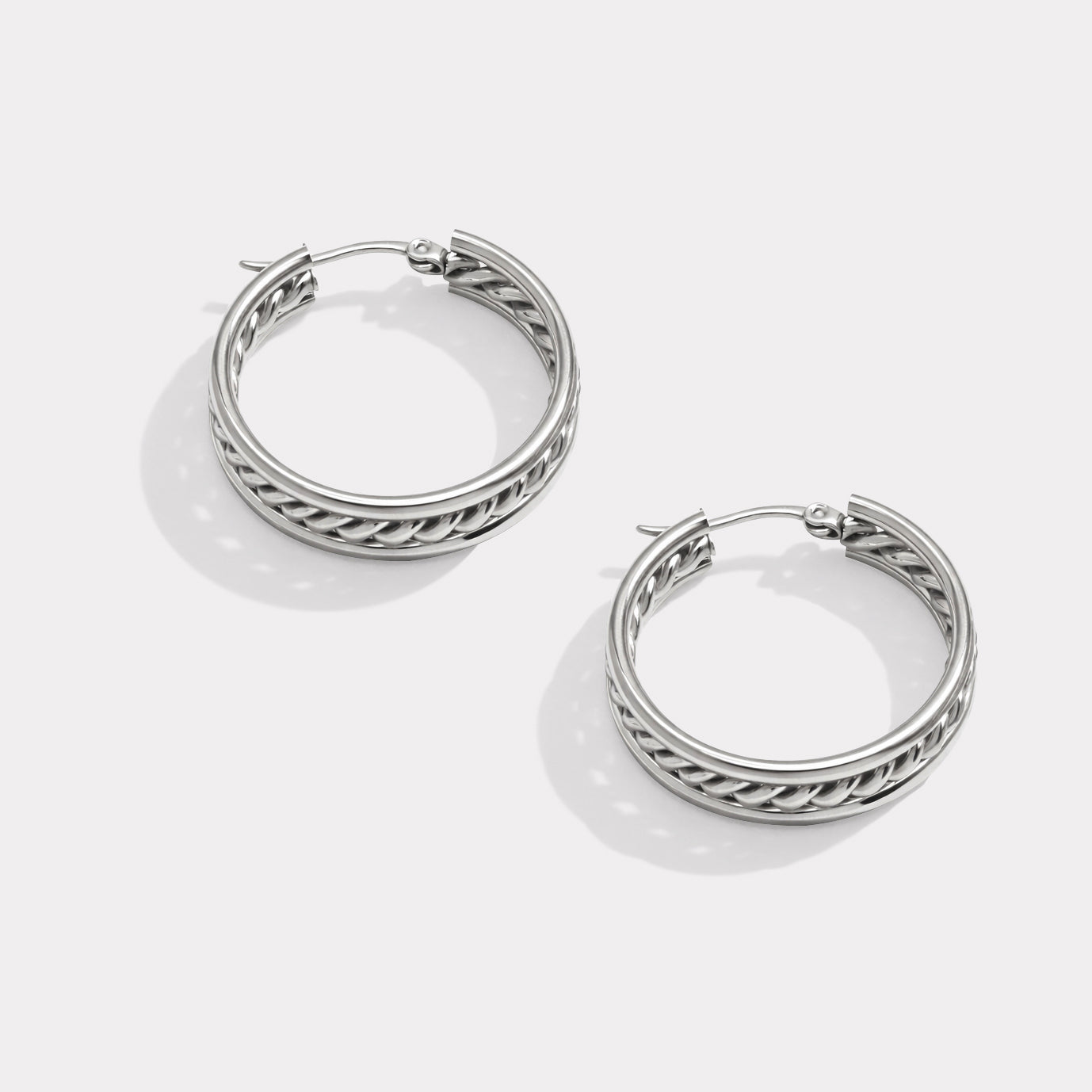 Silver stainless steel twisted hoop earrings – top view – Bizou