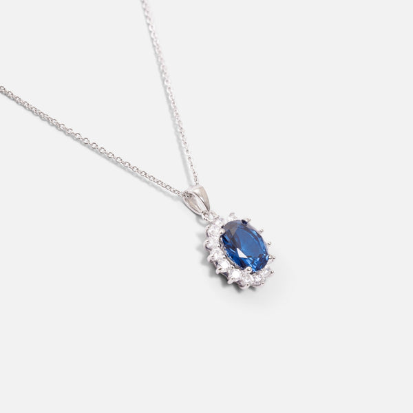 Load image into Gallery viewer, Thin sterling silver chain necklace with blue and silver cubic zirconia pendant
