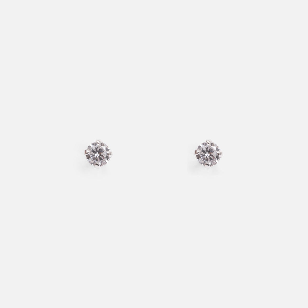 Sterling silver fixed earrings with small cubic zirconia stone