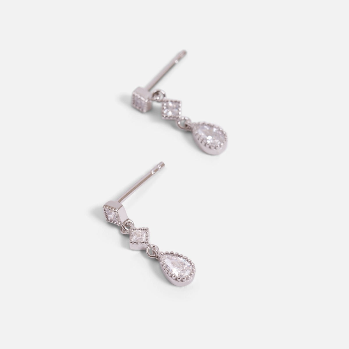 Sterling silver fixed earrings and cubic zirconia pendent