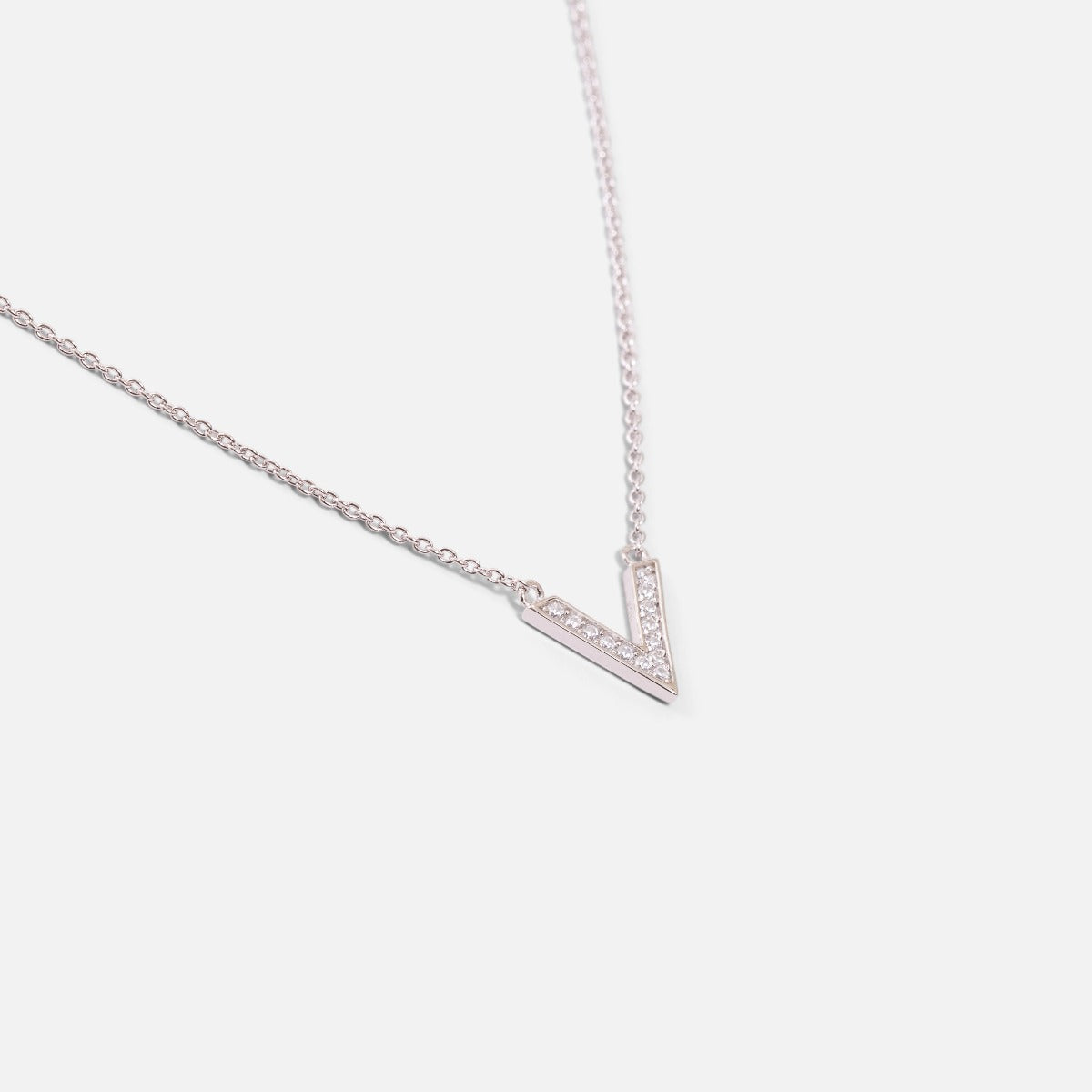 Thin sterling silver chain necklace and ‘’v’’ shaped cubic zirconia pendant