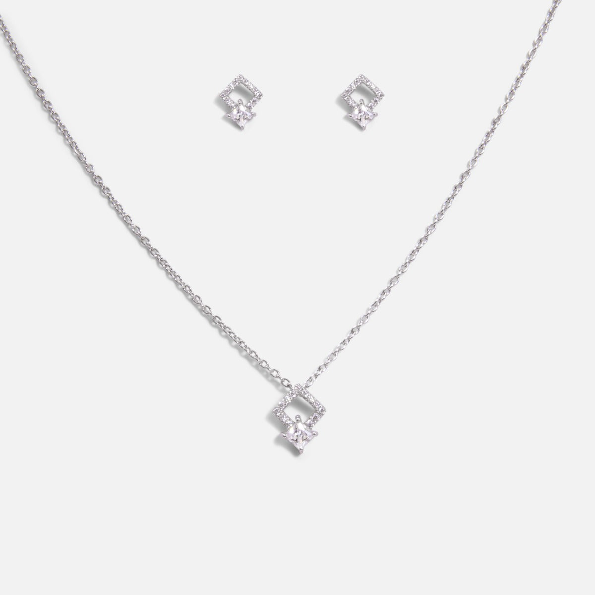 Sterling silver necklace and earrings set with square shaped cubic zirconia