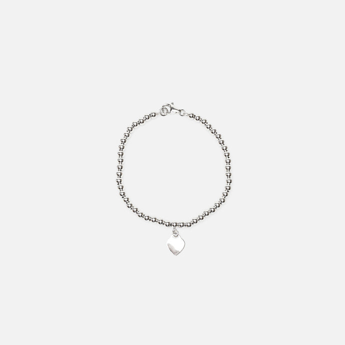 Bracelet argenté avec breloque coeur en argent sterling