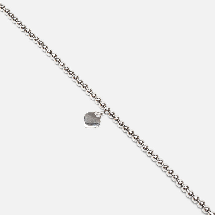 Bracelet argenté avec breloque coeur en argent sterling
