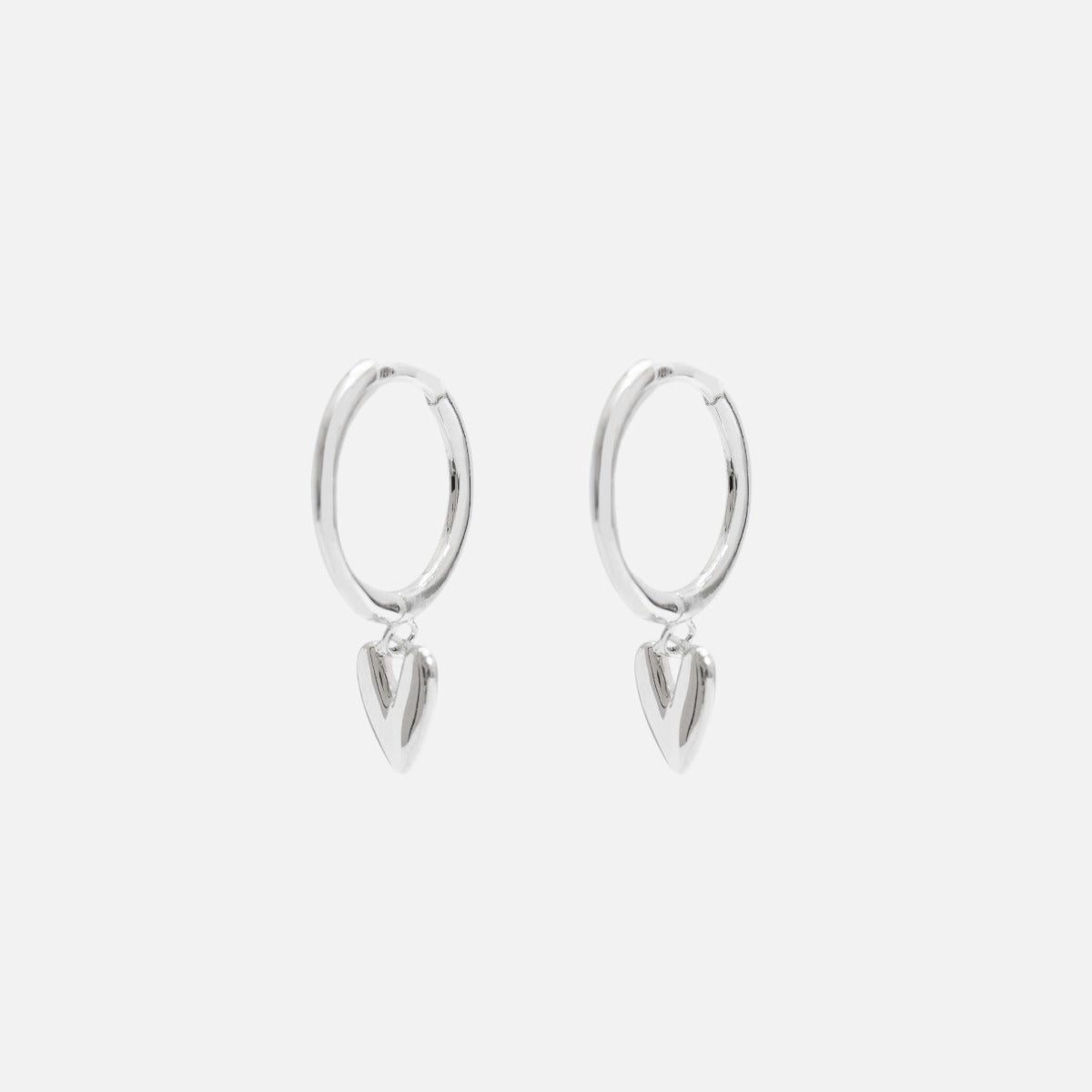 Sterling silver hoop earrings with heart charm