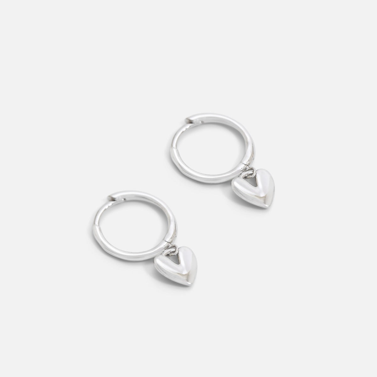 Sterling silver hoop earrings with heart charm