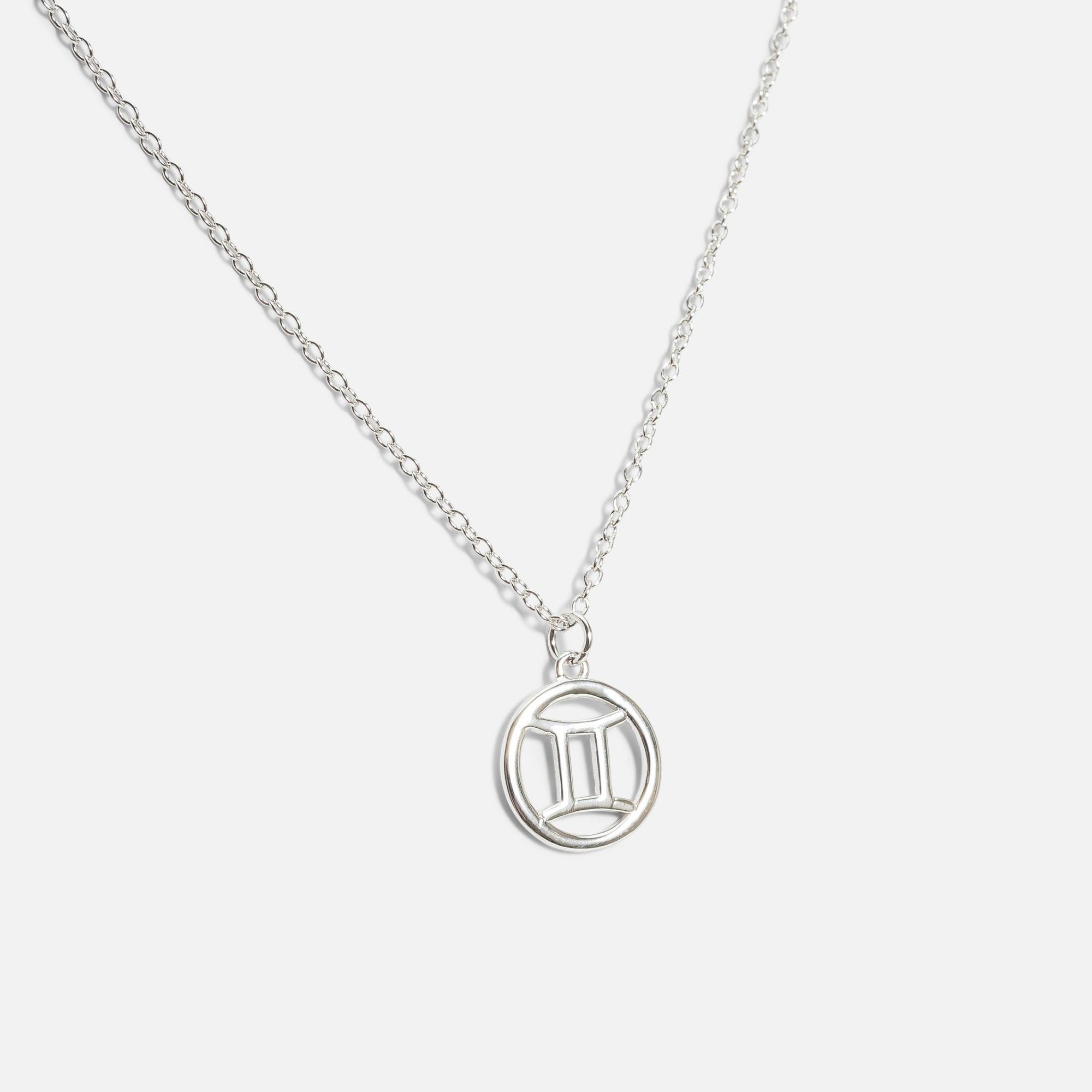 Sterling silver pendant with gemini zodiac sign