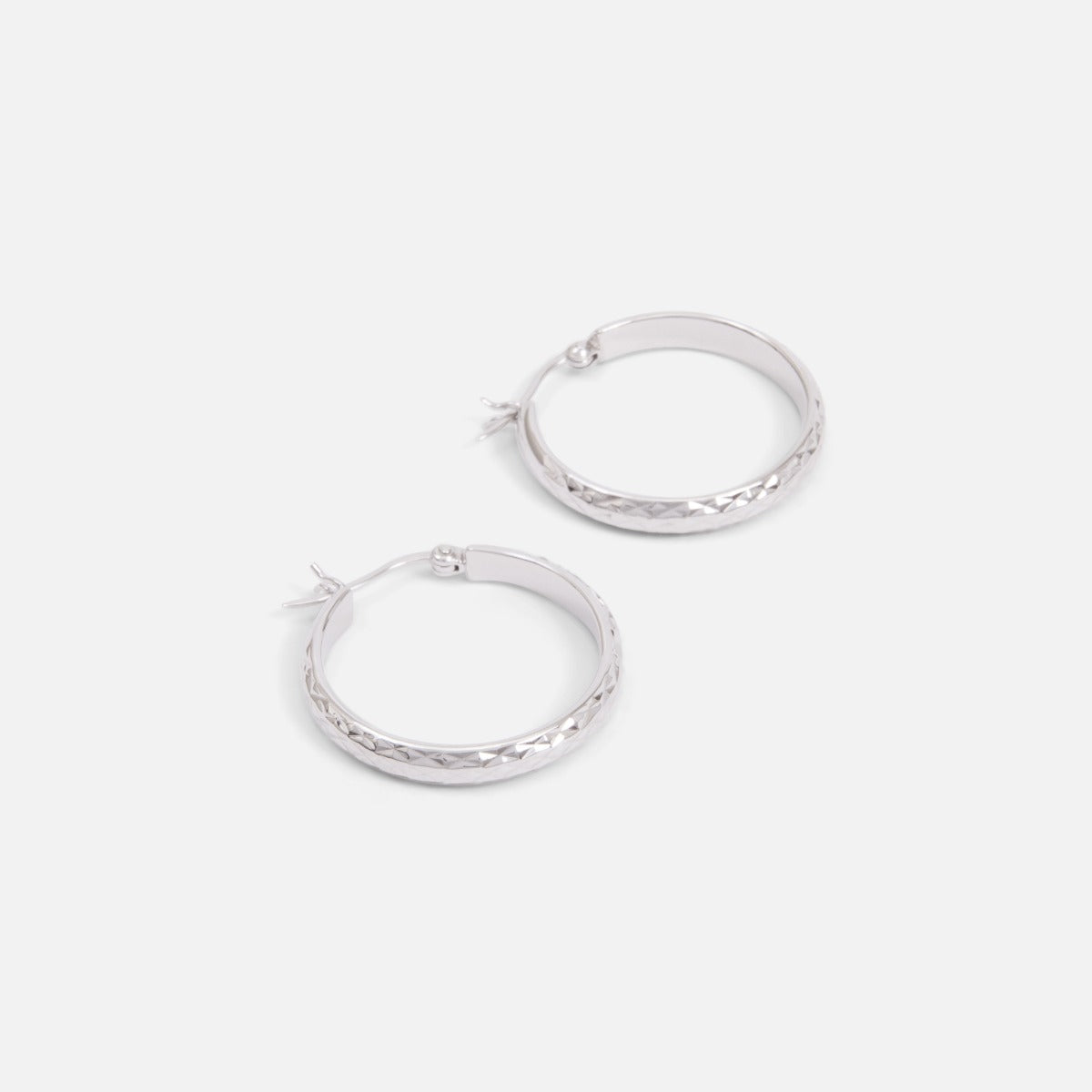 Facetted sterling silver hoop earrings