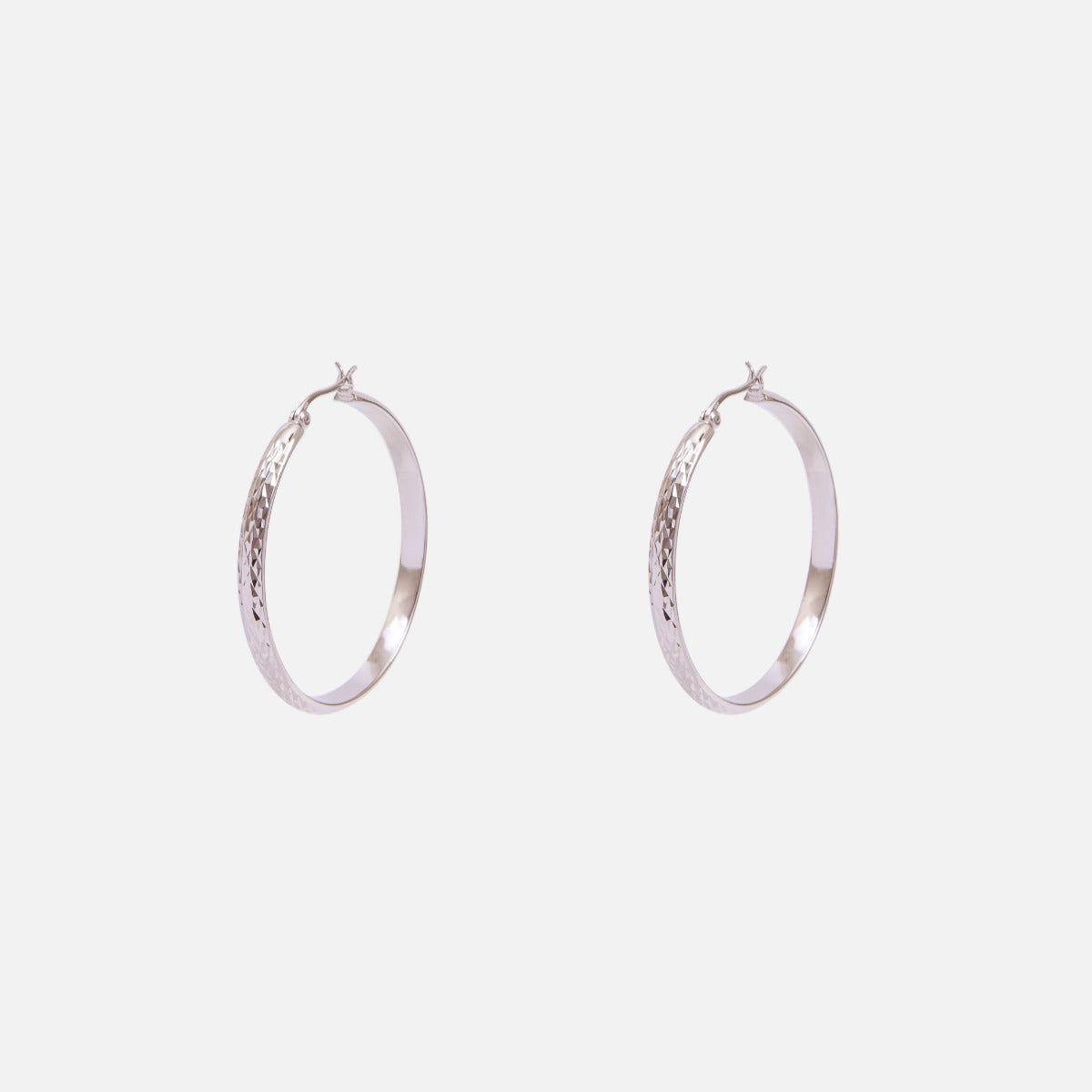 Sterling silver faceted hoop earrings