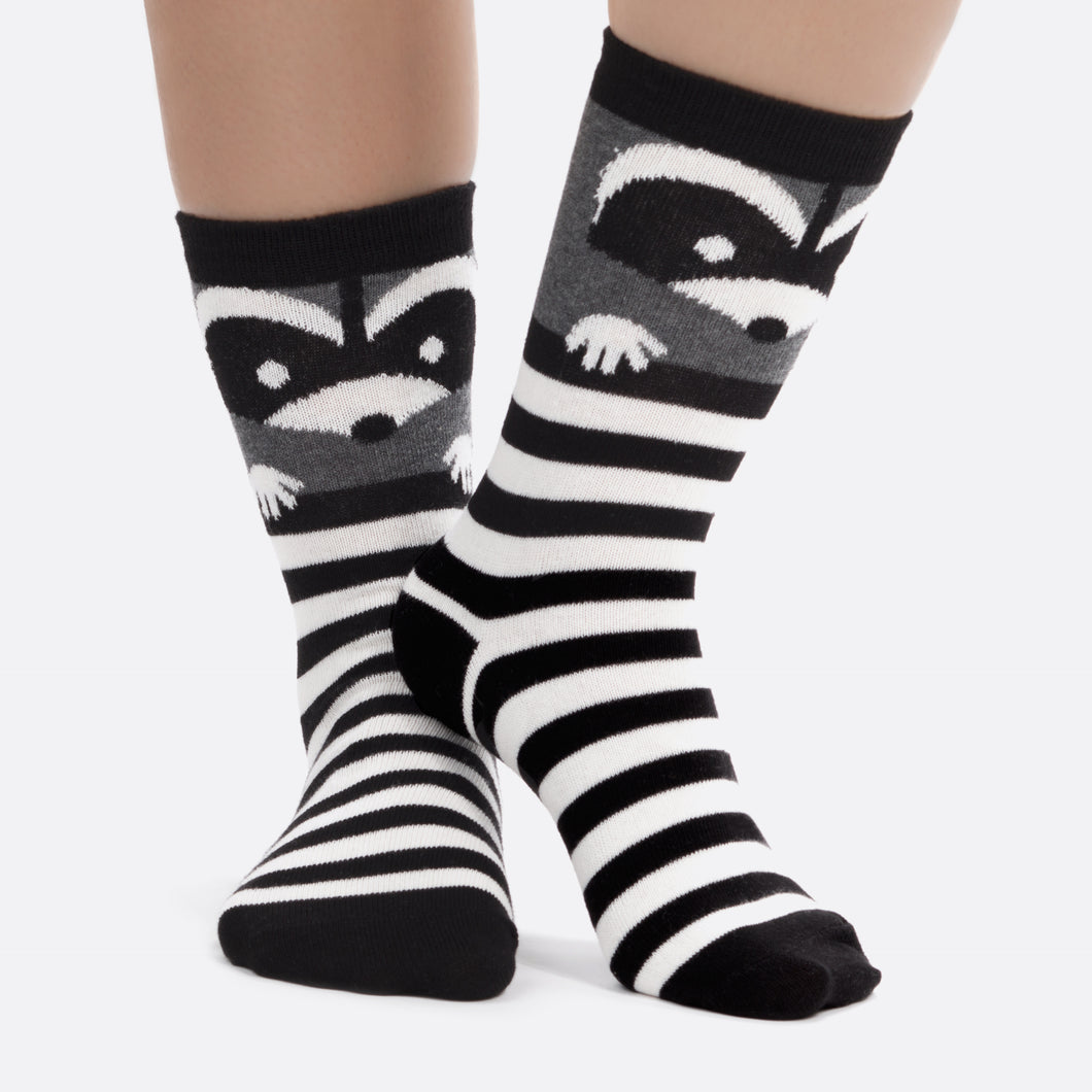 Black and white stripes socks with raccoon