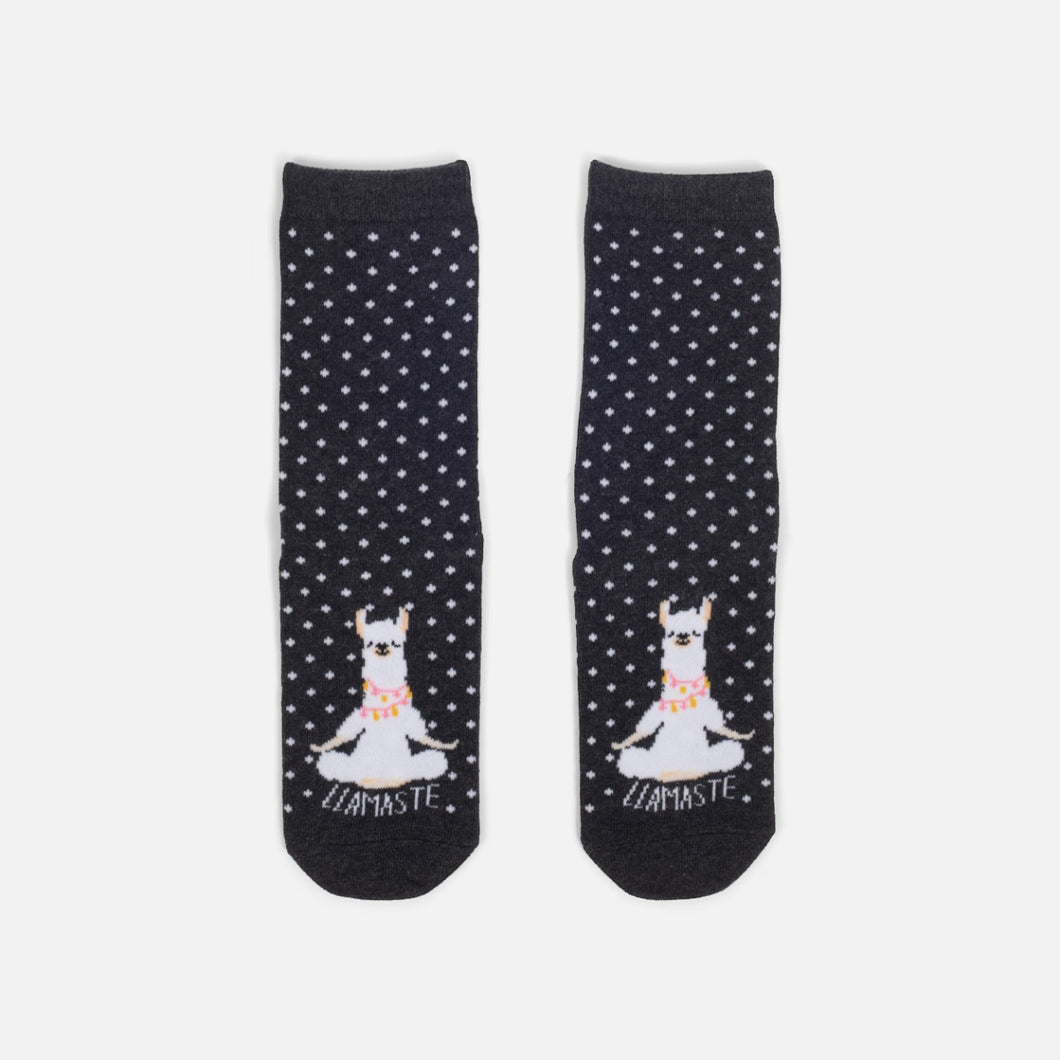 Black socks with white dots and llamas   