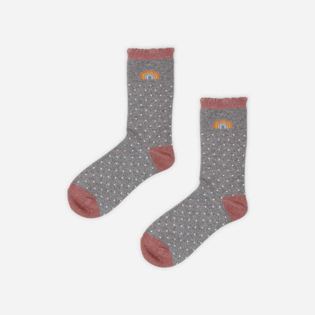 Grey socks with white polka dots and rainbow