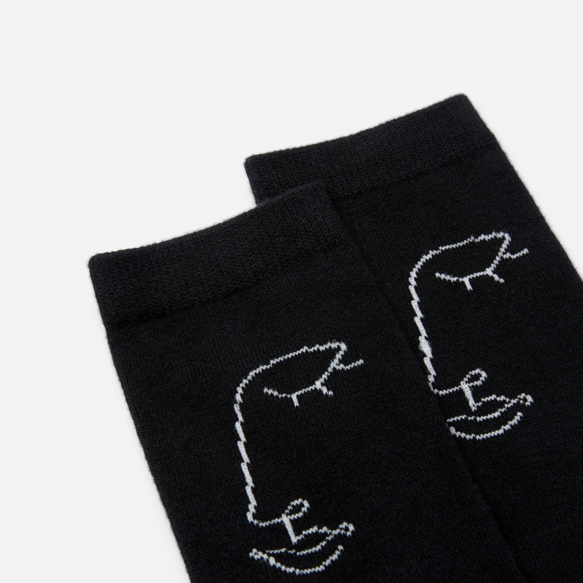 Black socks with faces 