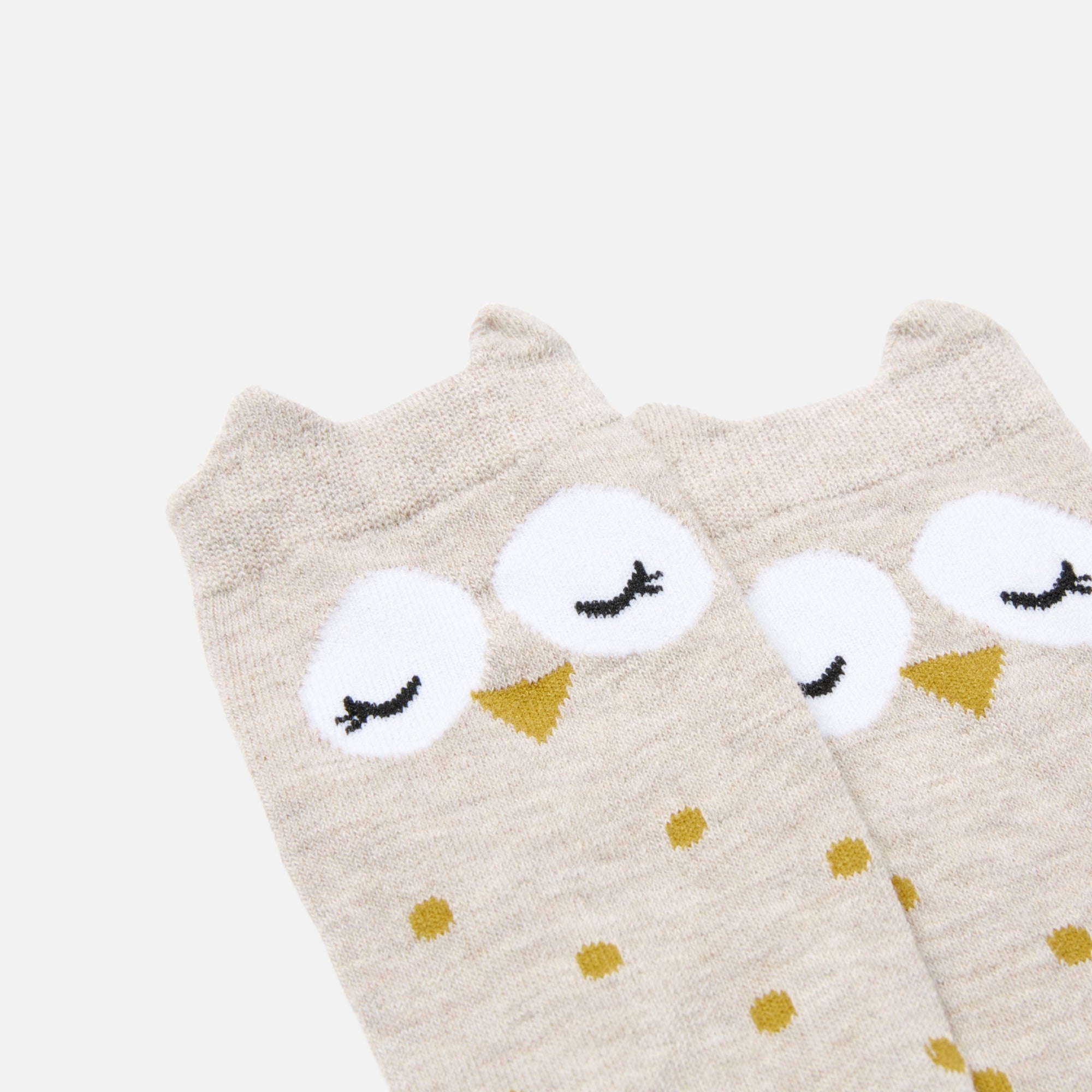 Beige socks with owl