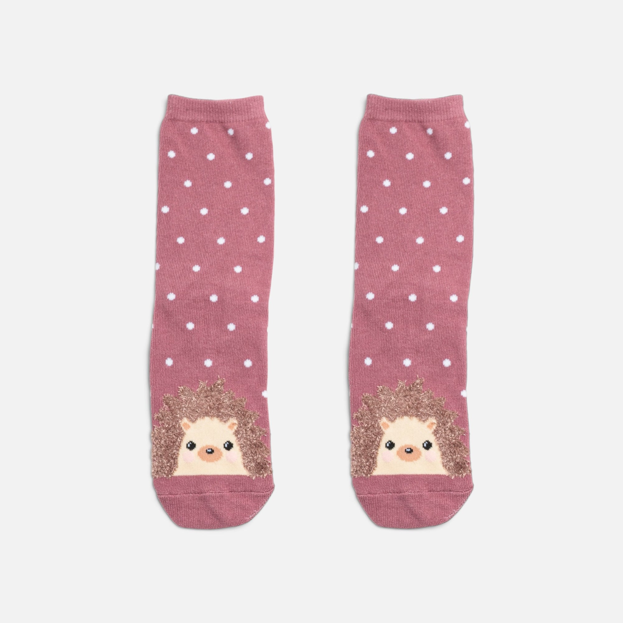 Pink socks with white polka dots and hedgehog 