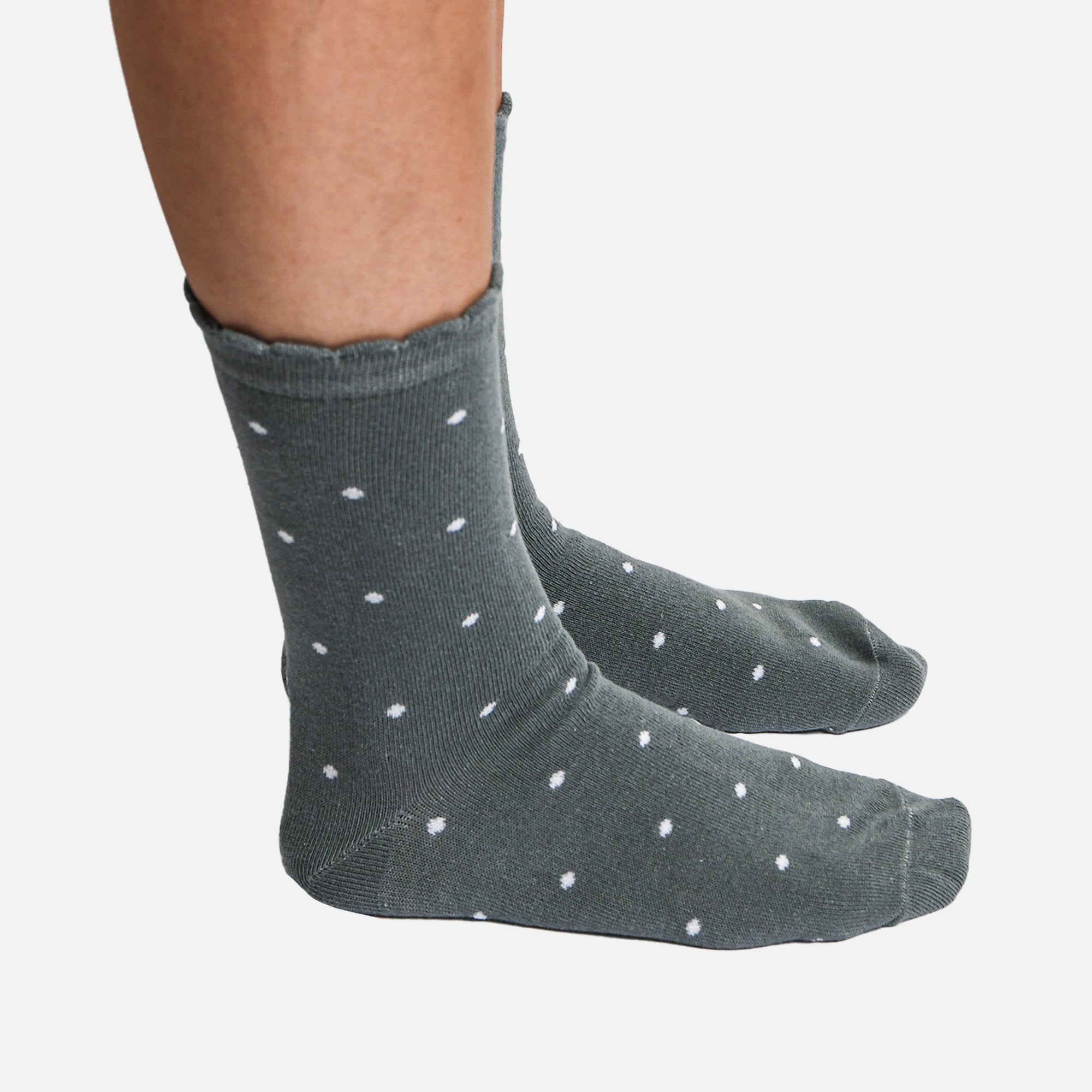 Green socks with dots