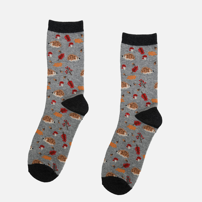 Grey socks with hedgehog and leaves