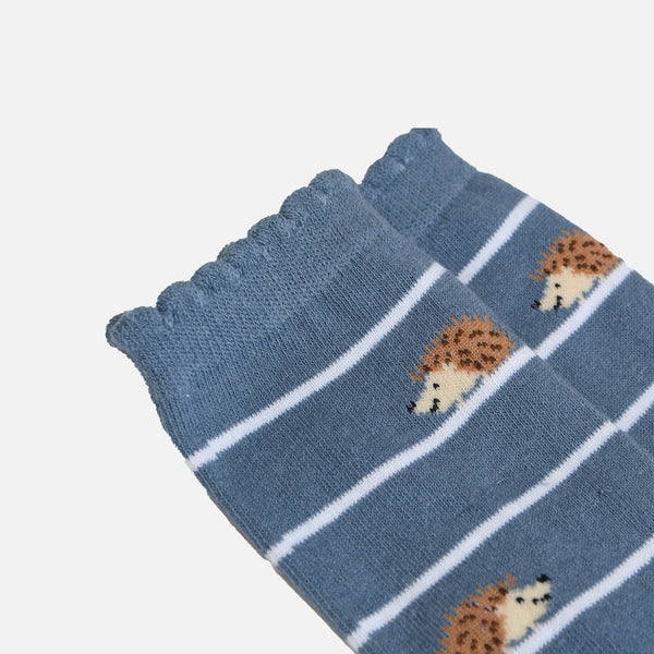 Load image into Gallery viewer, Blue socks with hedgehog on stripes
