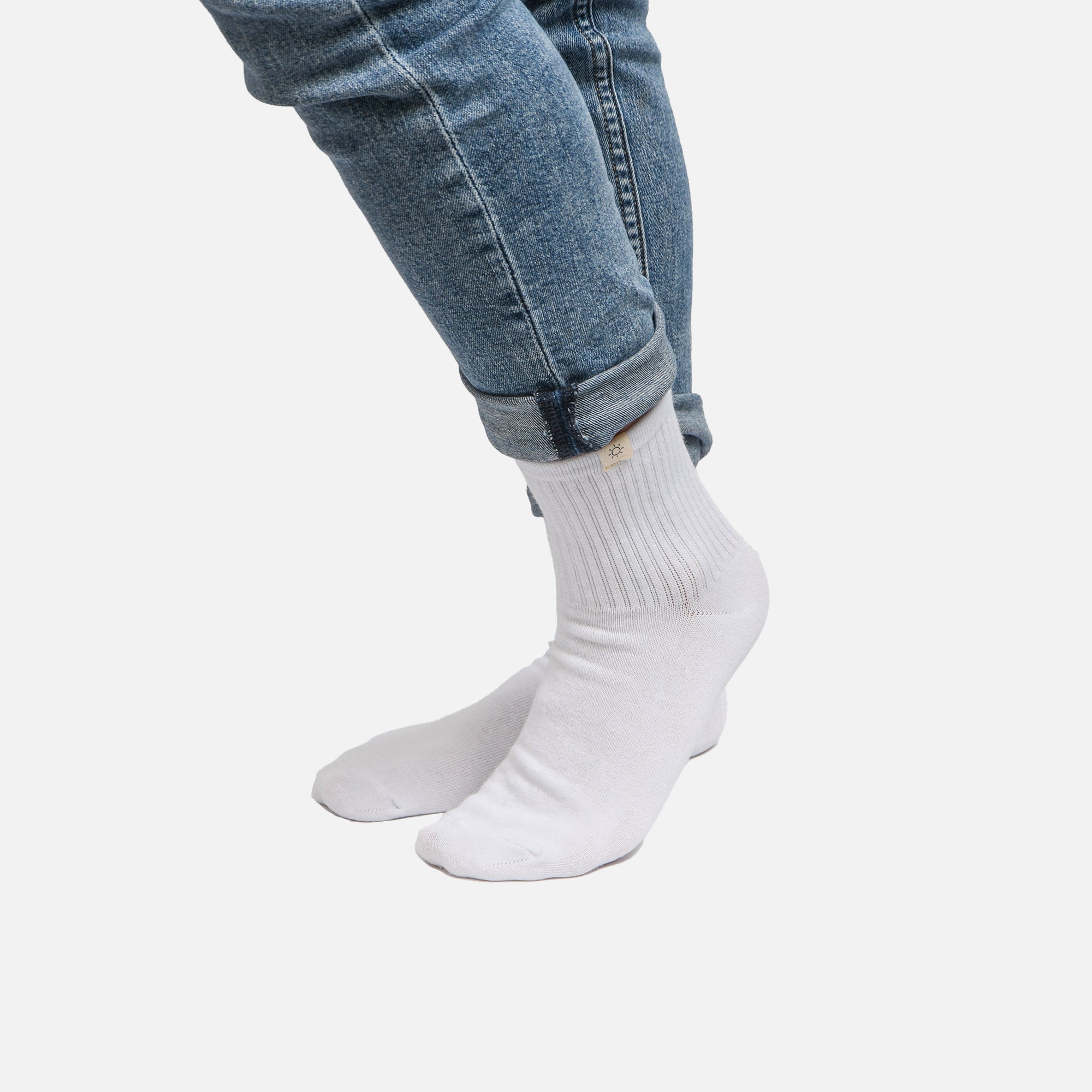 White socks with sun label