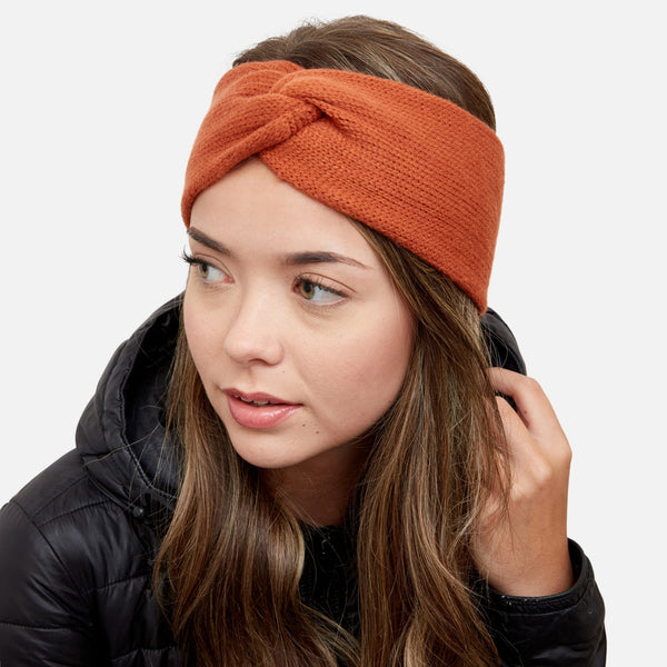 Load image into Gallery viewer, Rust color twisted knit headband with knot
