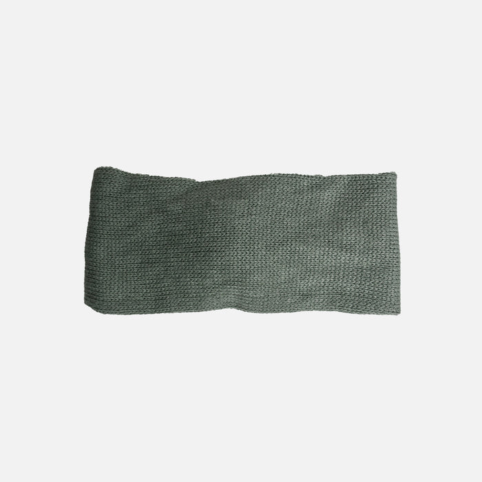 Bandeau vert torsadé en tricot