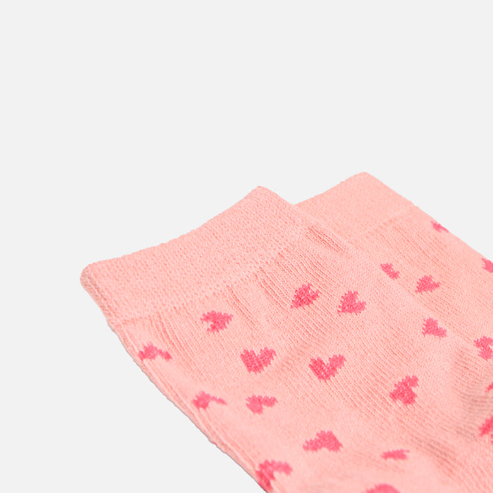 Bas pour enfants roses avec coeurs