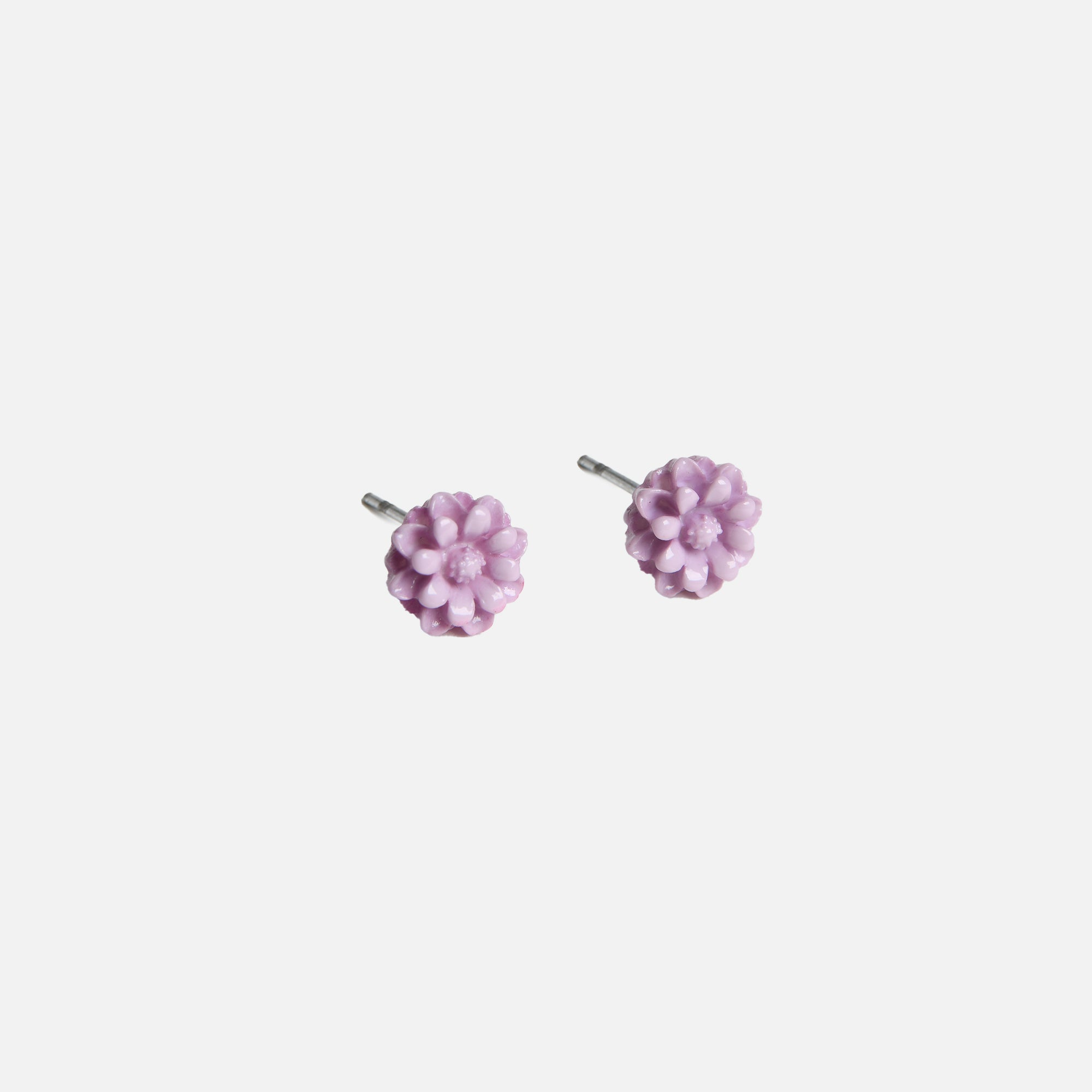 Set of three earrings with purple flowers