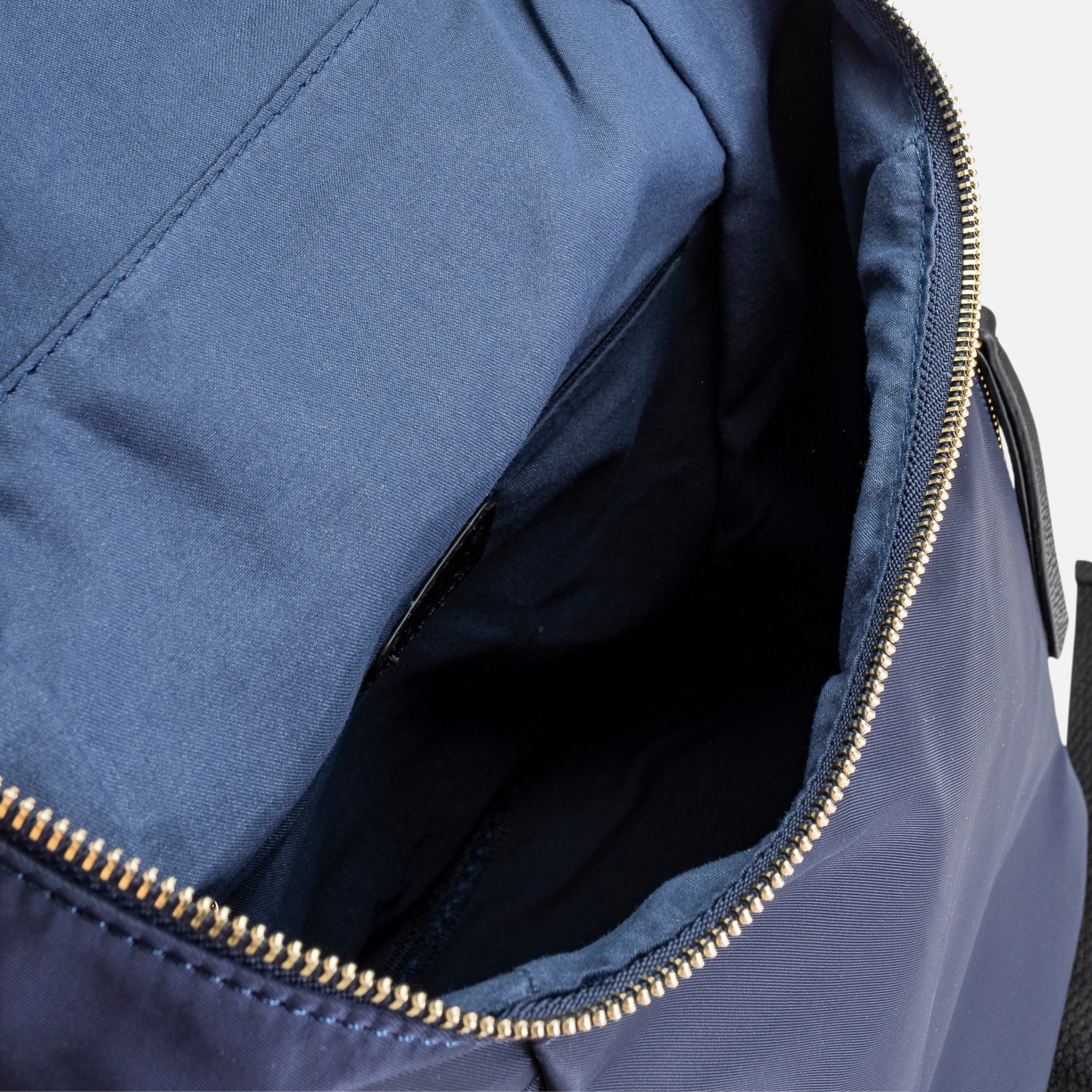 Navy blue nylon zippered backpack