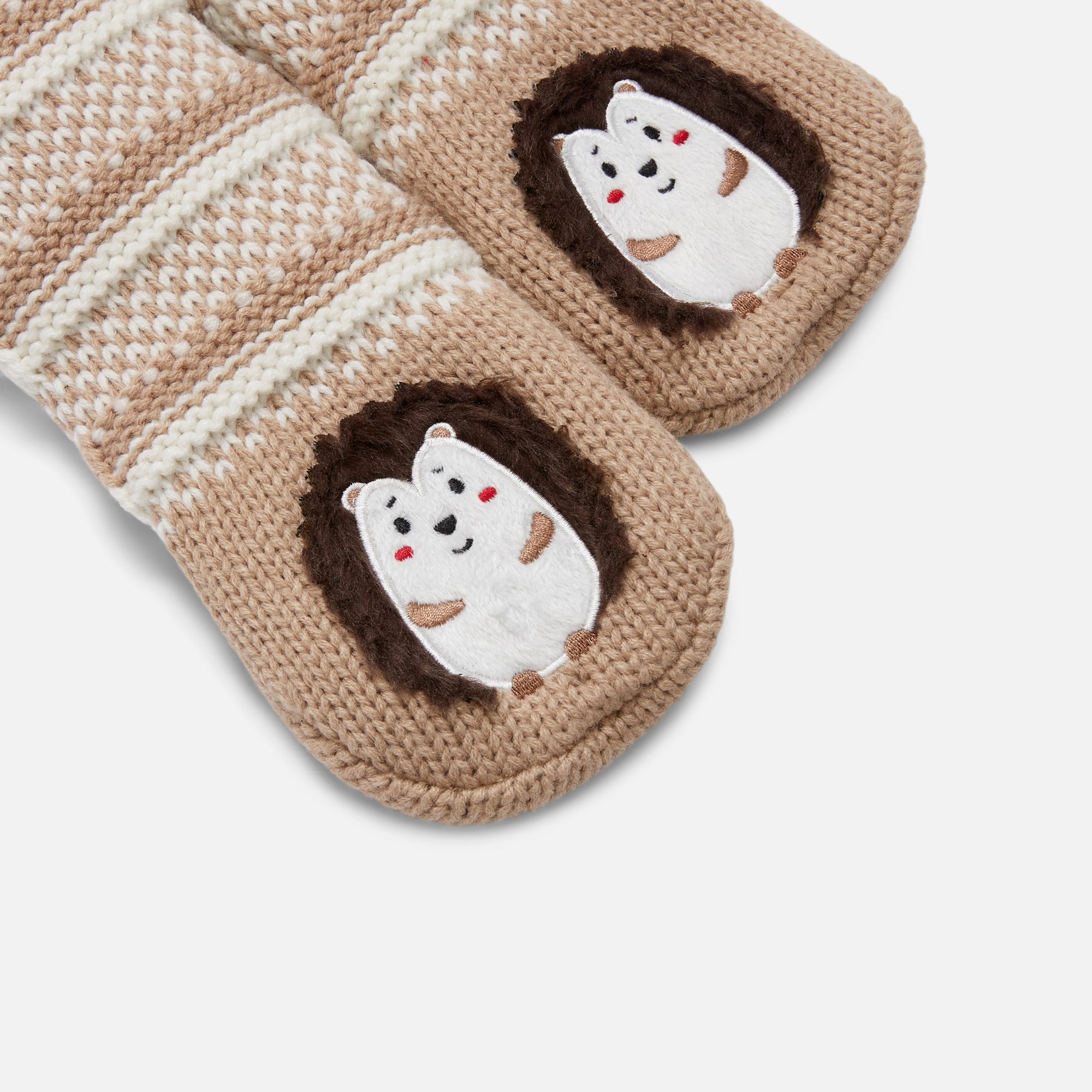 Beige slipper socks with hedgehog