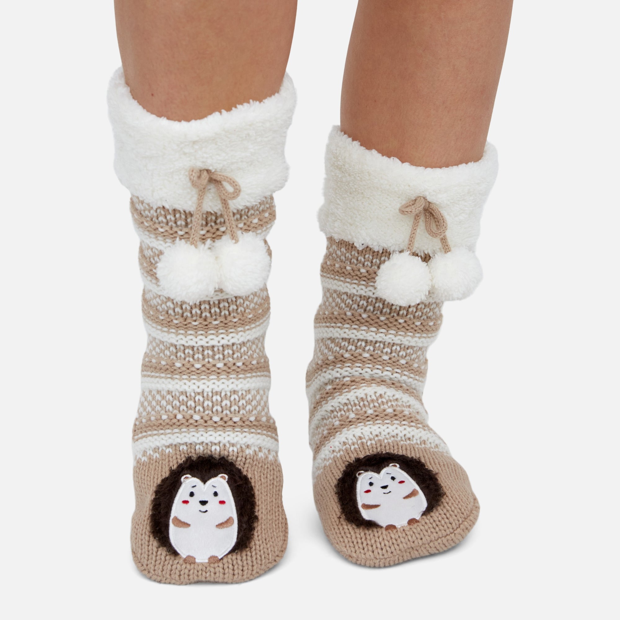 Beige slipper socks with hedgehog