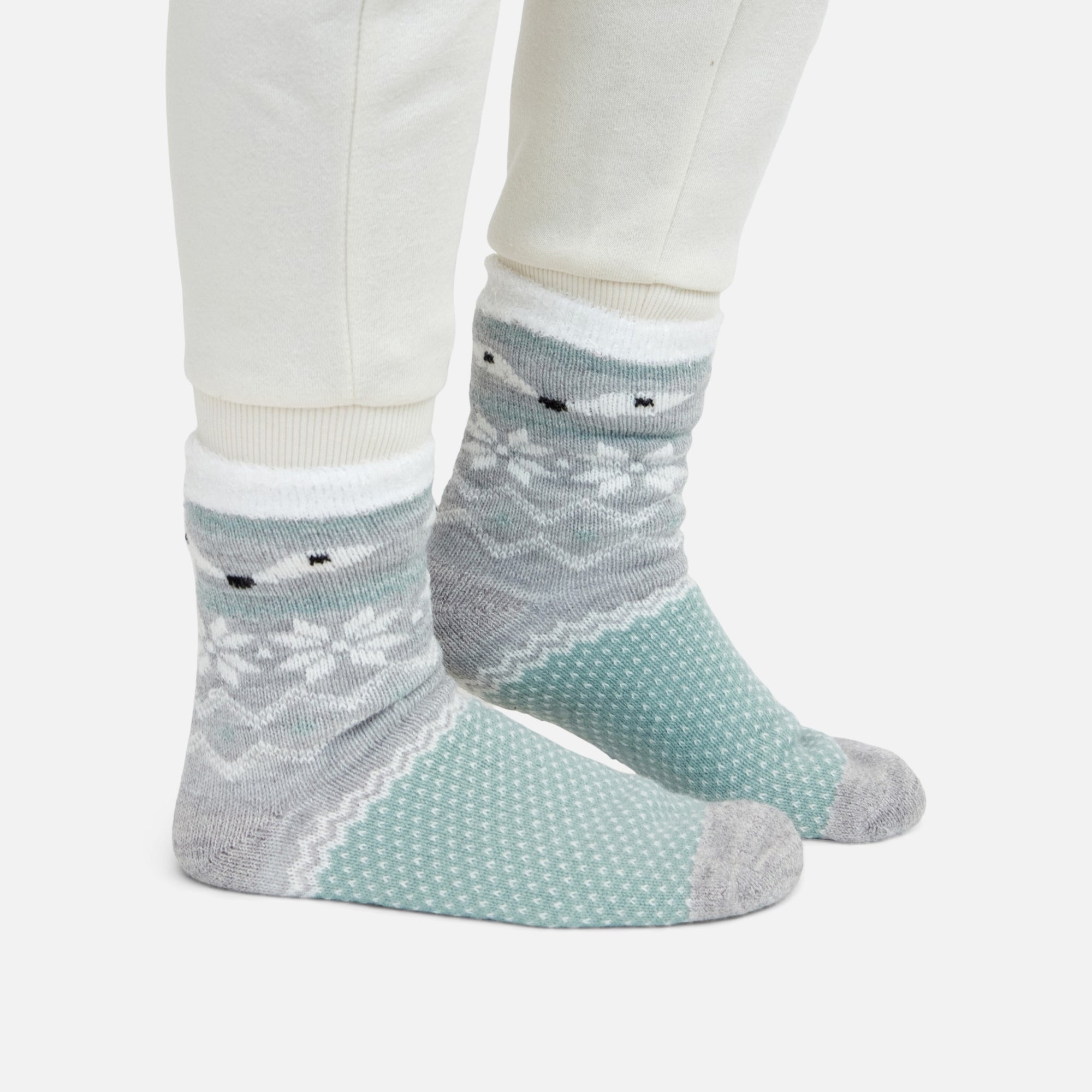 Grey cozy socks with norwegian patterns and fox faces