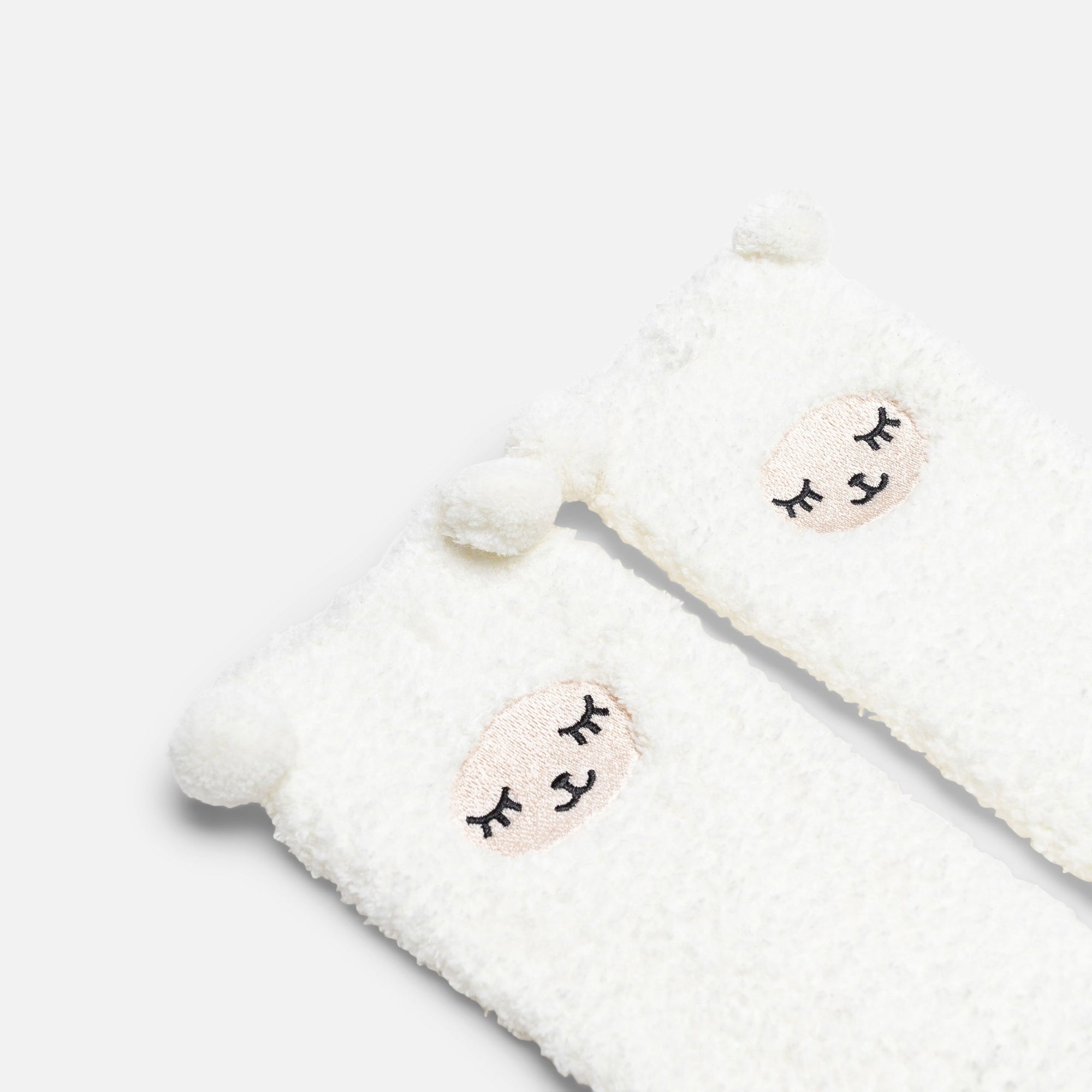 Cozy socks and sleeping mask with sheep 