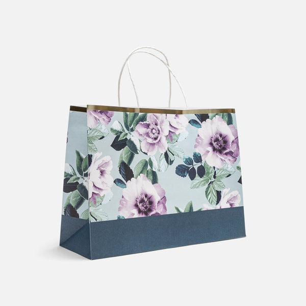 Load image into Gallery viewer, Large gift bag with flower print for operation enfant soleil 
