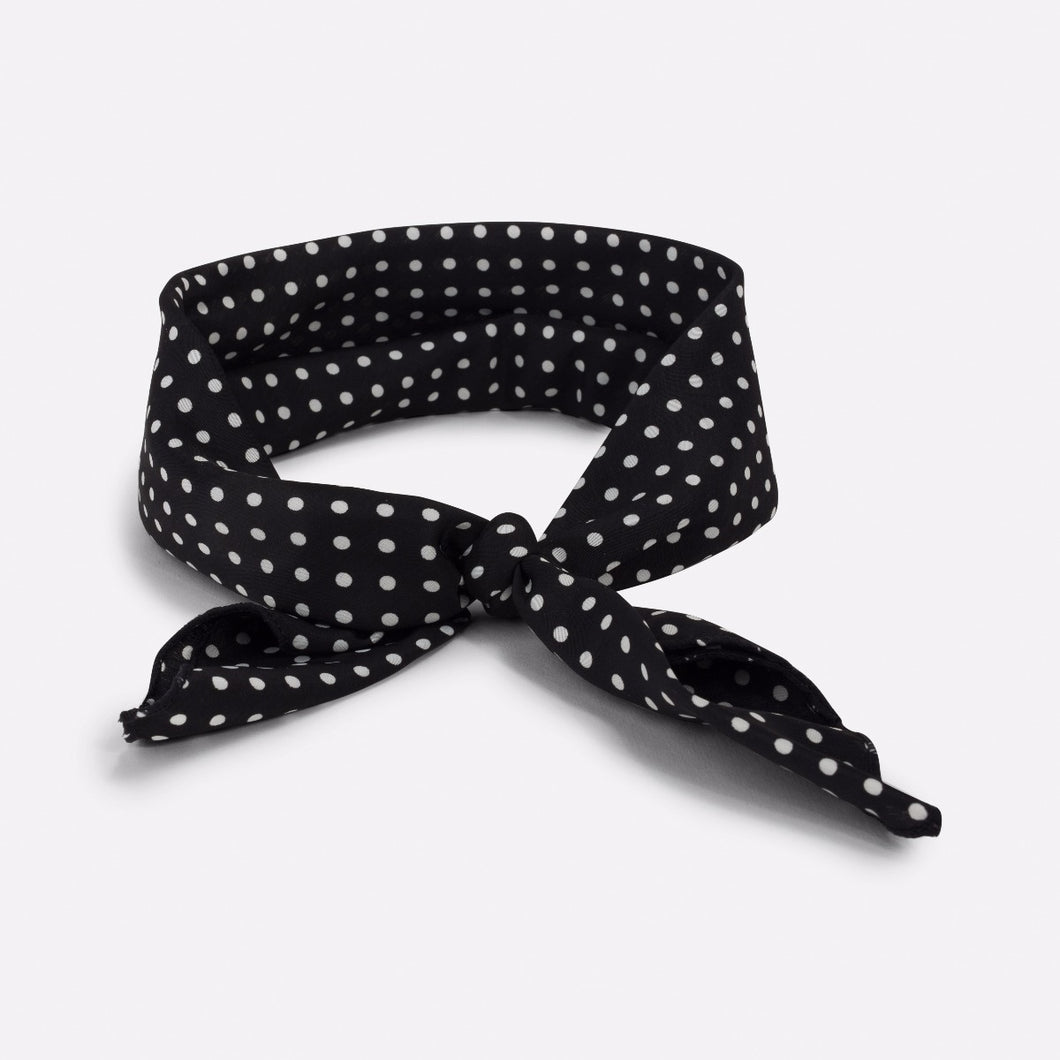 Black headband with white polka dots