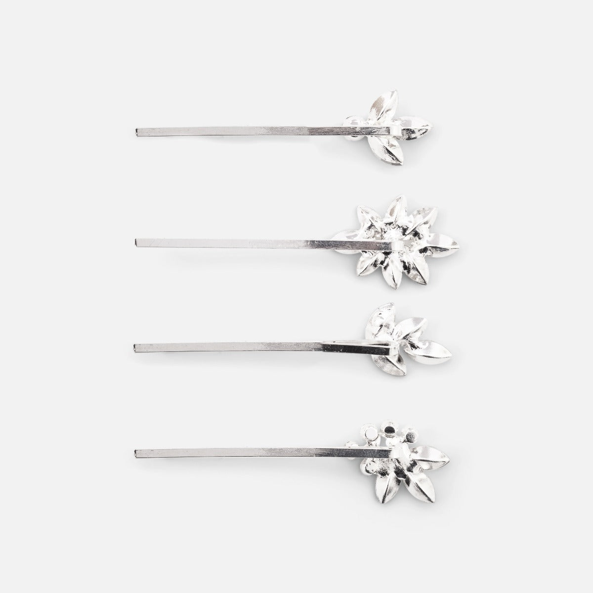 Set of silver hairpins with flower-shaped arrangement
